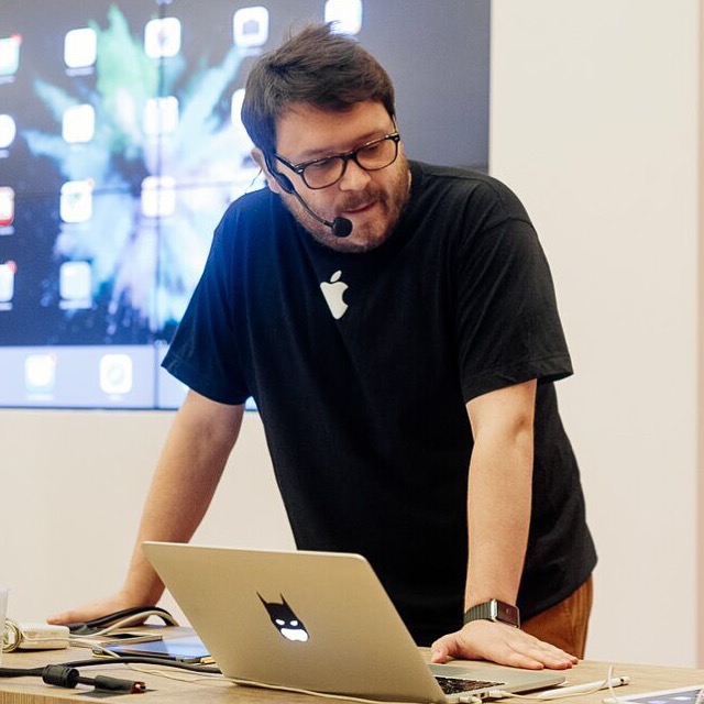 Kirill Naumov leading a demonstration at a laptop
